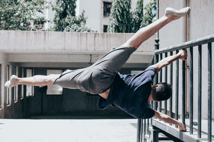Manish practices a little bit of parkour outside the Academy in Andheri
