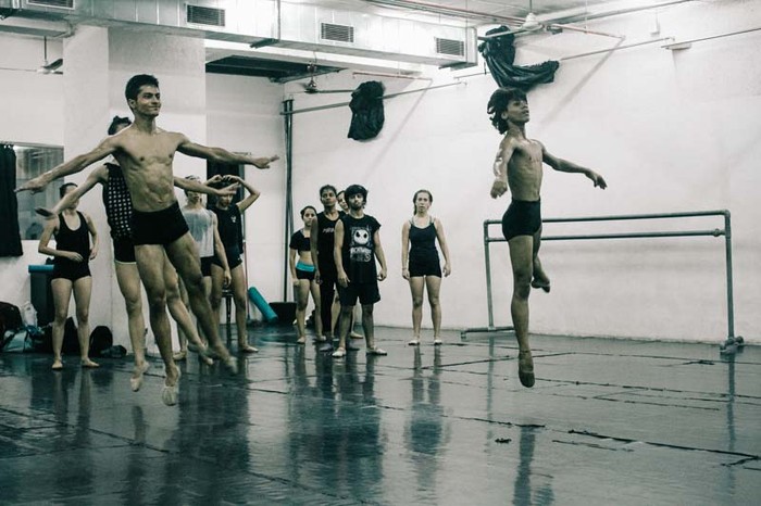 Manish and Amir launch into the air as their peers look on