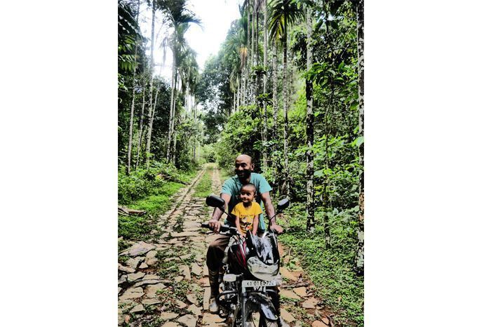 Hill station happiness (The caretaker and his lovely son Kavin). Hill station happiness (The caretaker and his lovely son Kavin).